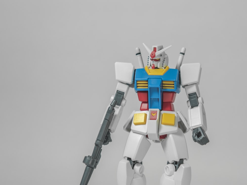white blue and red robot toy