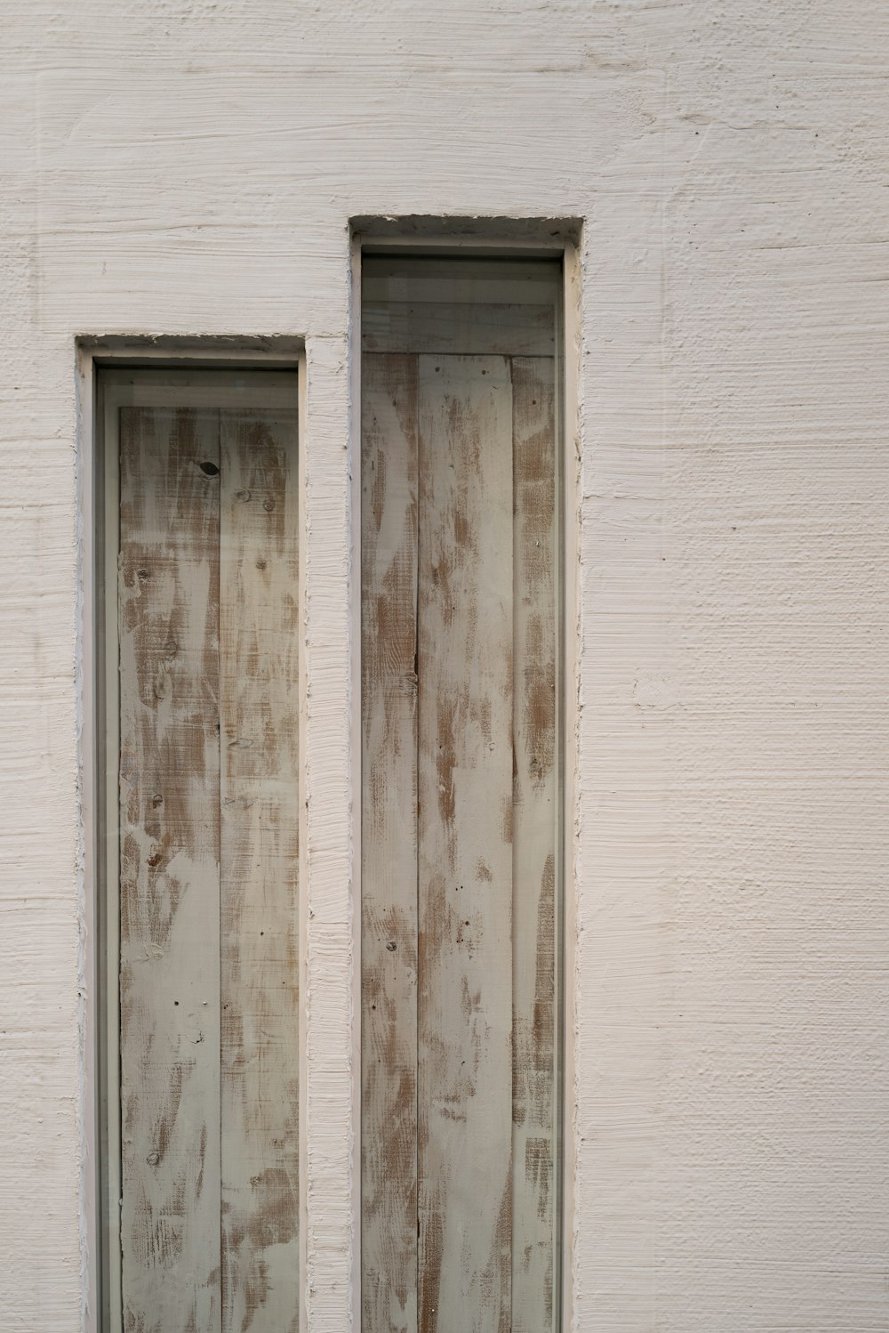 white wooden door with black steel door knob