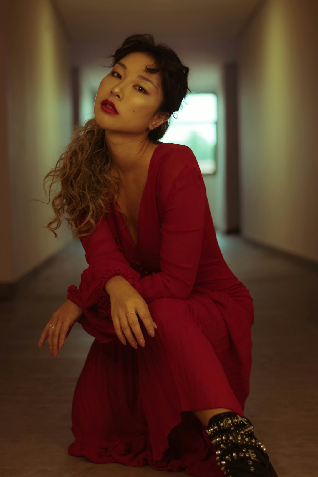 woman in red long sleeve dress