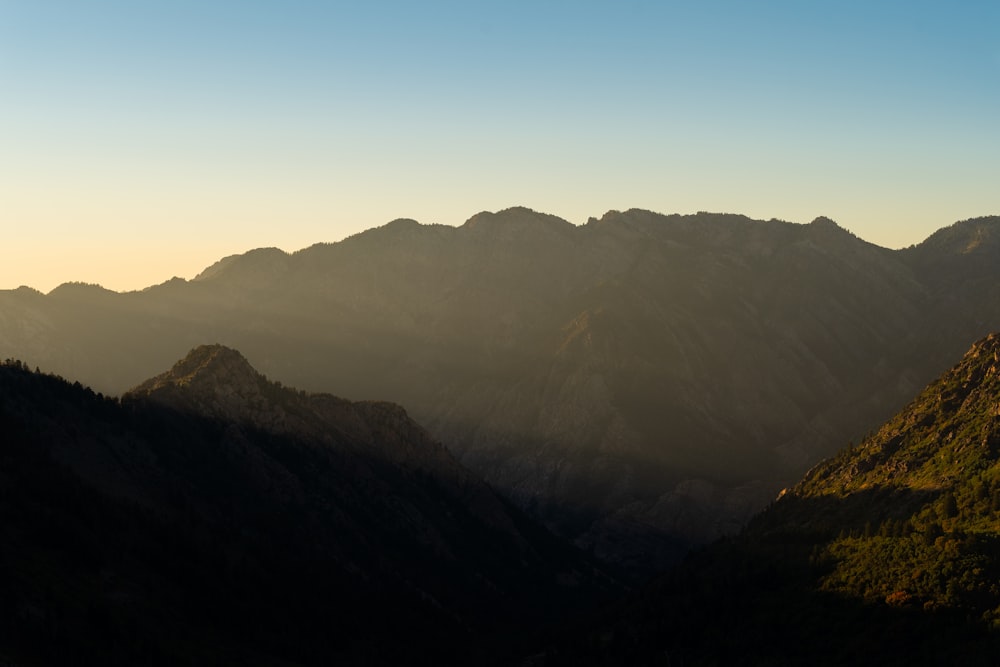 mountains under blue sky during daytime