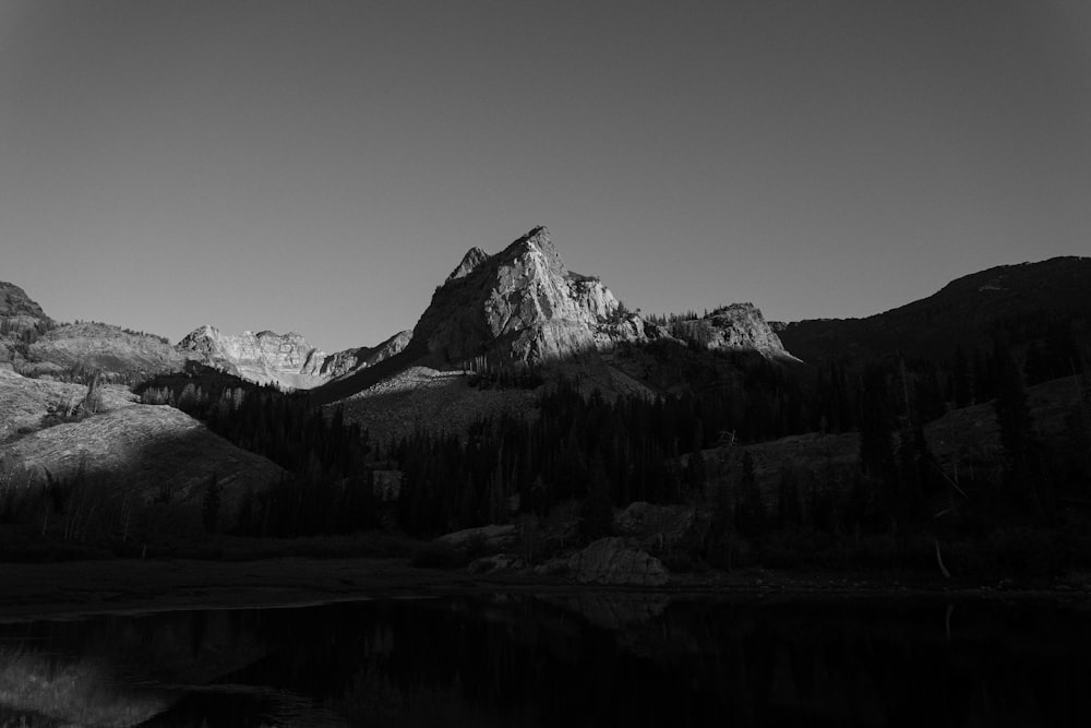 grayscale photo of snow covered mountain