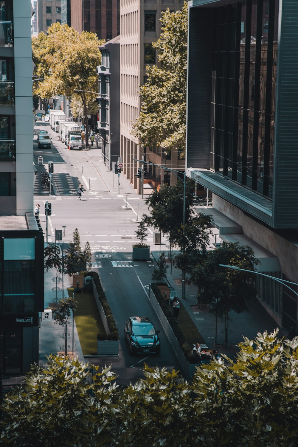 cars parked beside the road during daytime