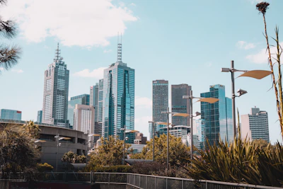 A futuristic city skyline under a clear sky symbolizing sustainable growth.