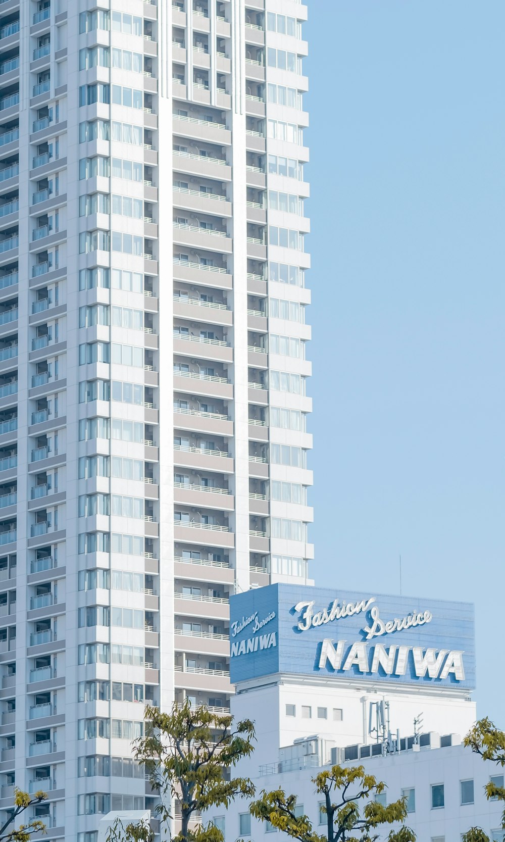 white concrete building under blue sky during daytime