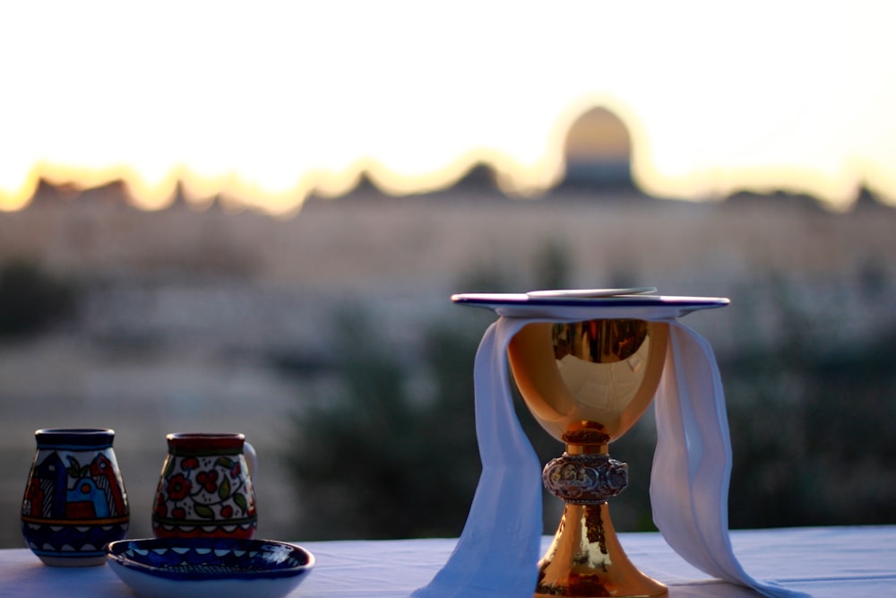 gold trophy on white table