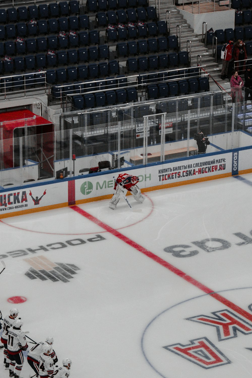 ice hockey players on ice hockey field