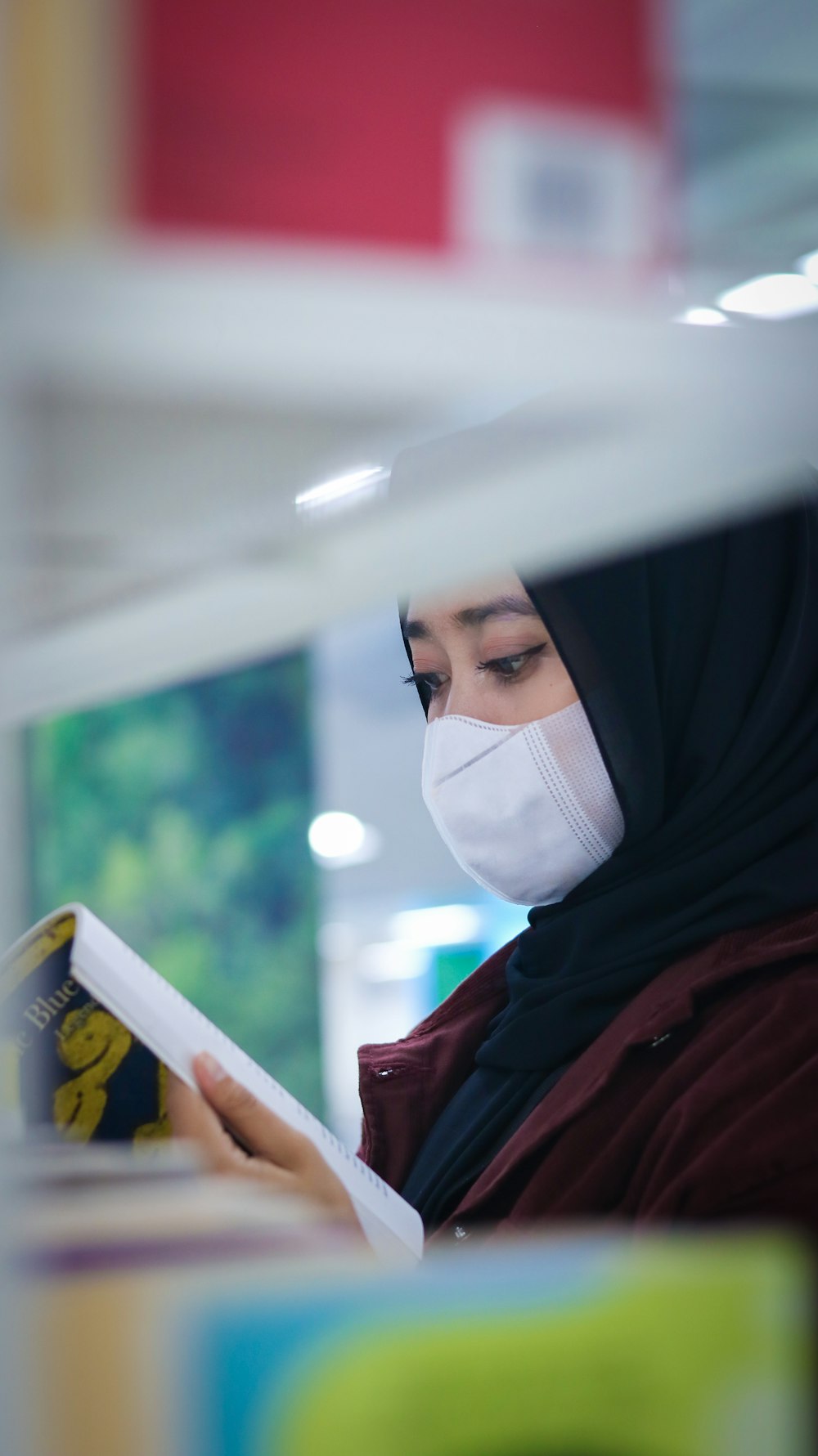 woman in white hijab and brown abaya