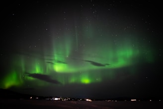 green aurora lights during night time