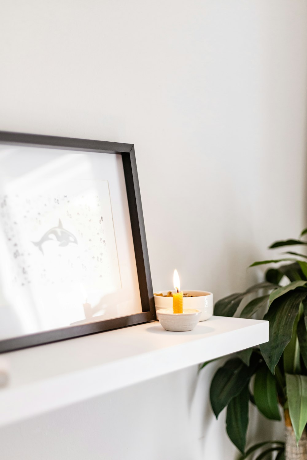 white ceramic bowl on white table