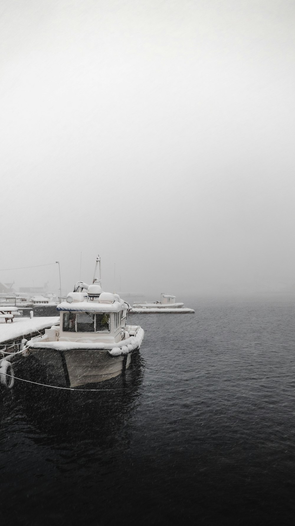 white and brown boat on sea during daytime