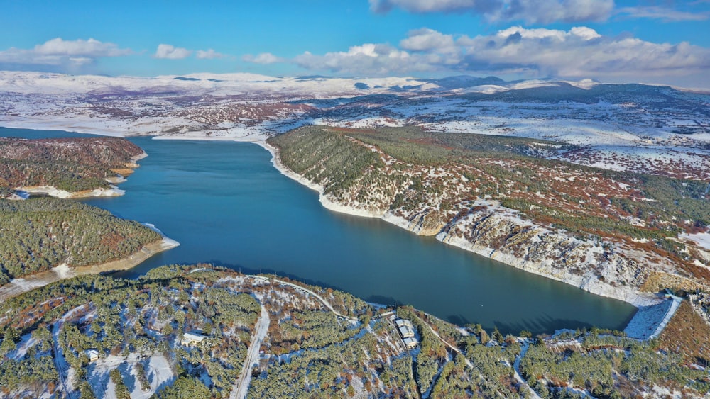 aerial view of city near body of water during daytime