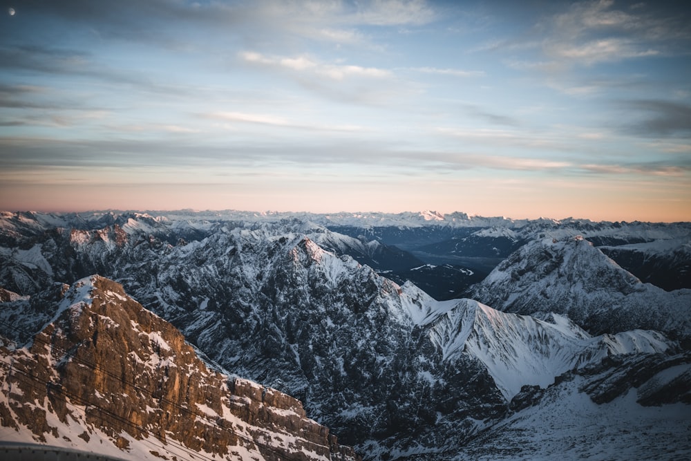 gray rocky mountain under gray sky