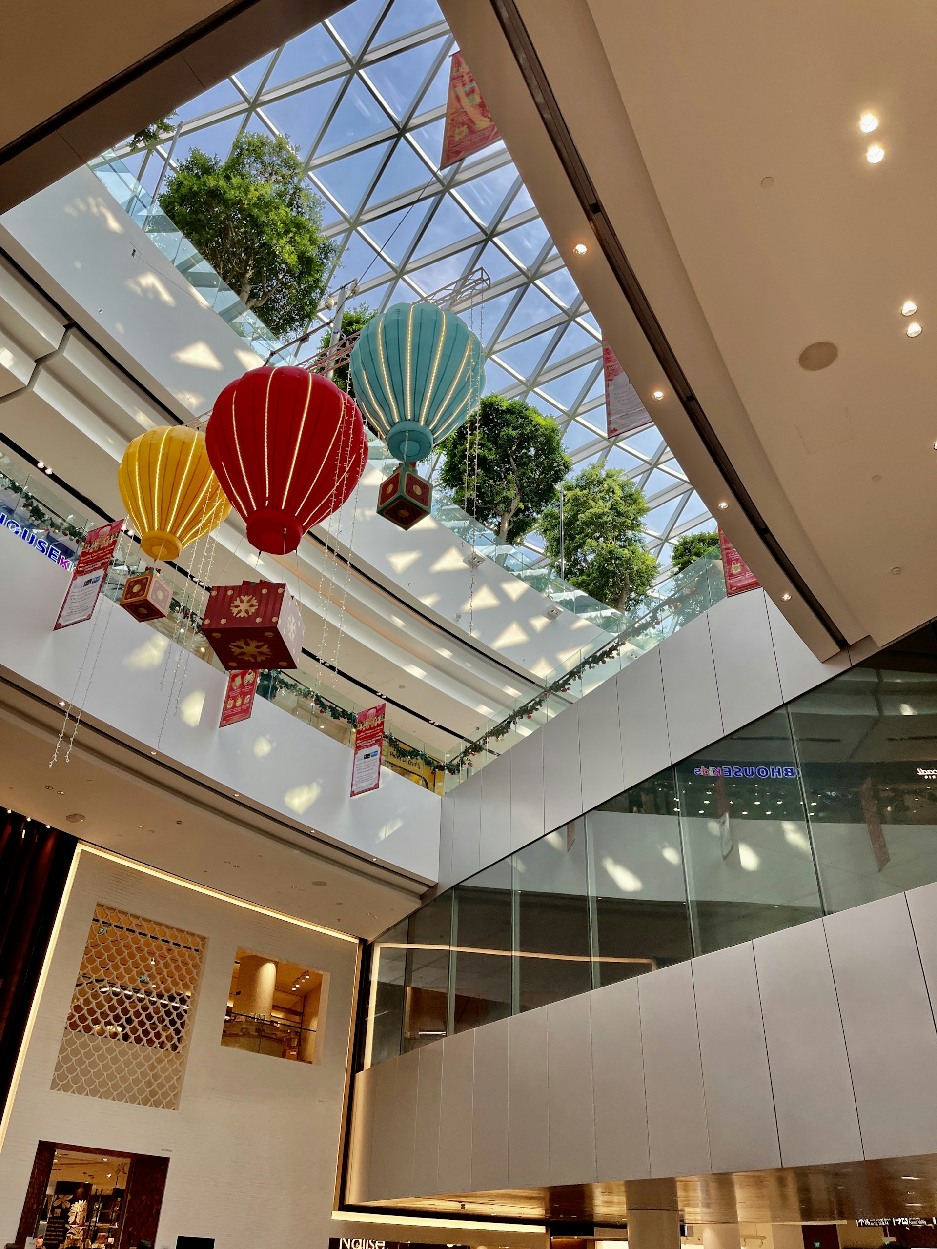 woman wearing yellow long-sleeved dress under white clouds and blue sky during daytime
