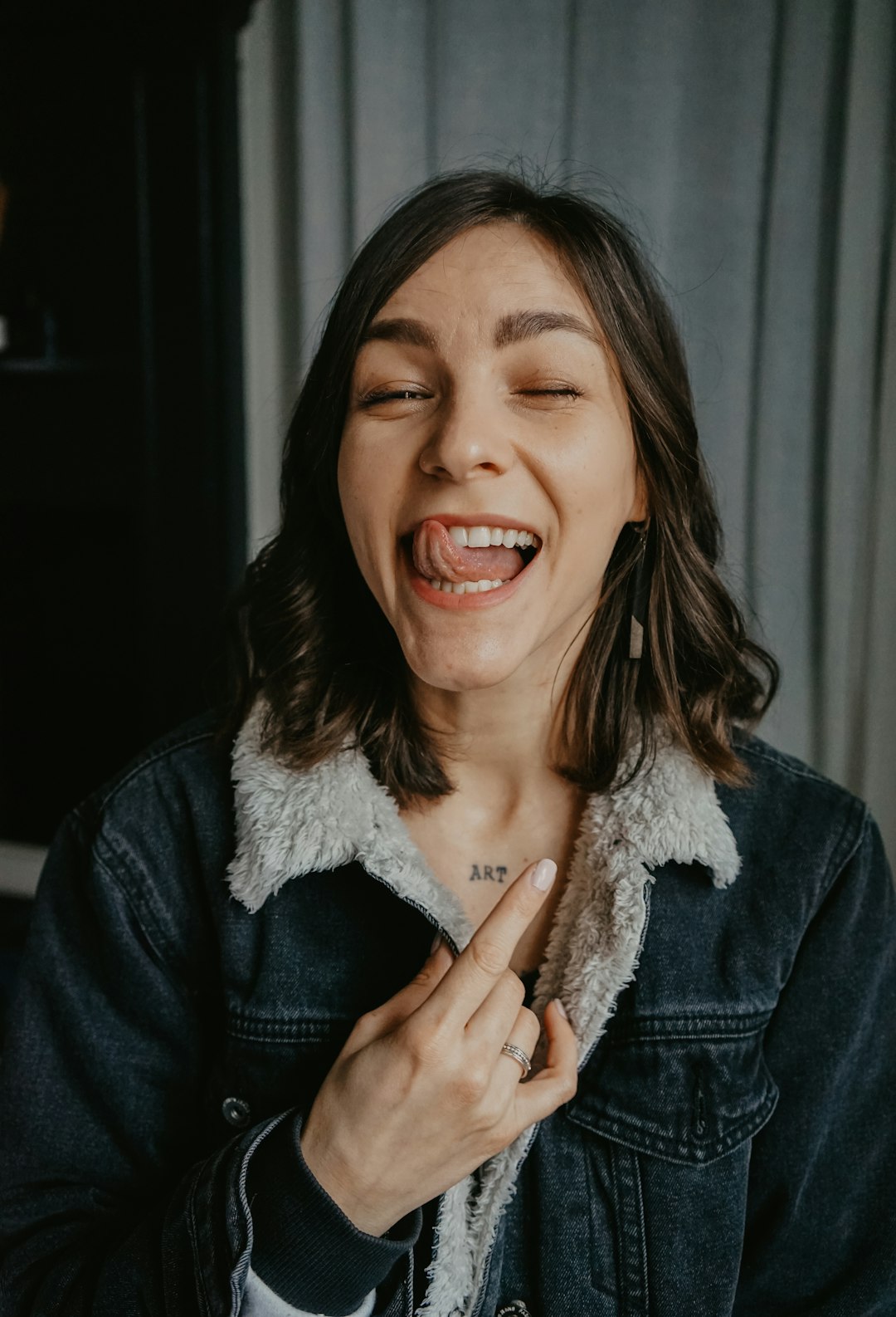 smiling woman in black jacket