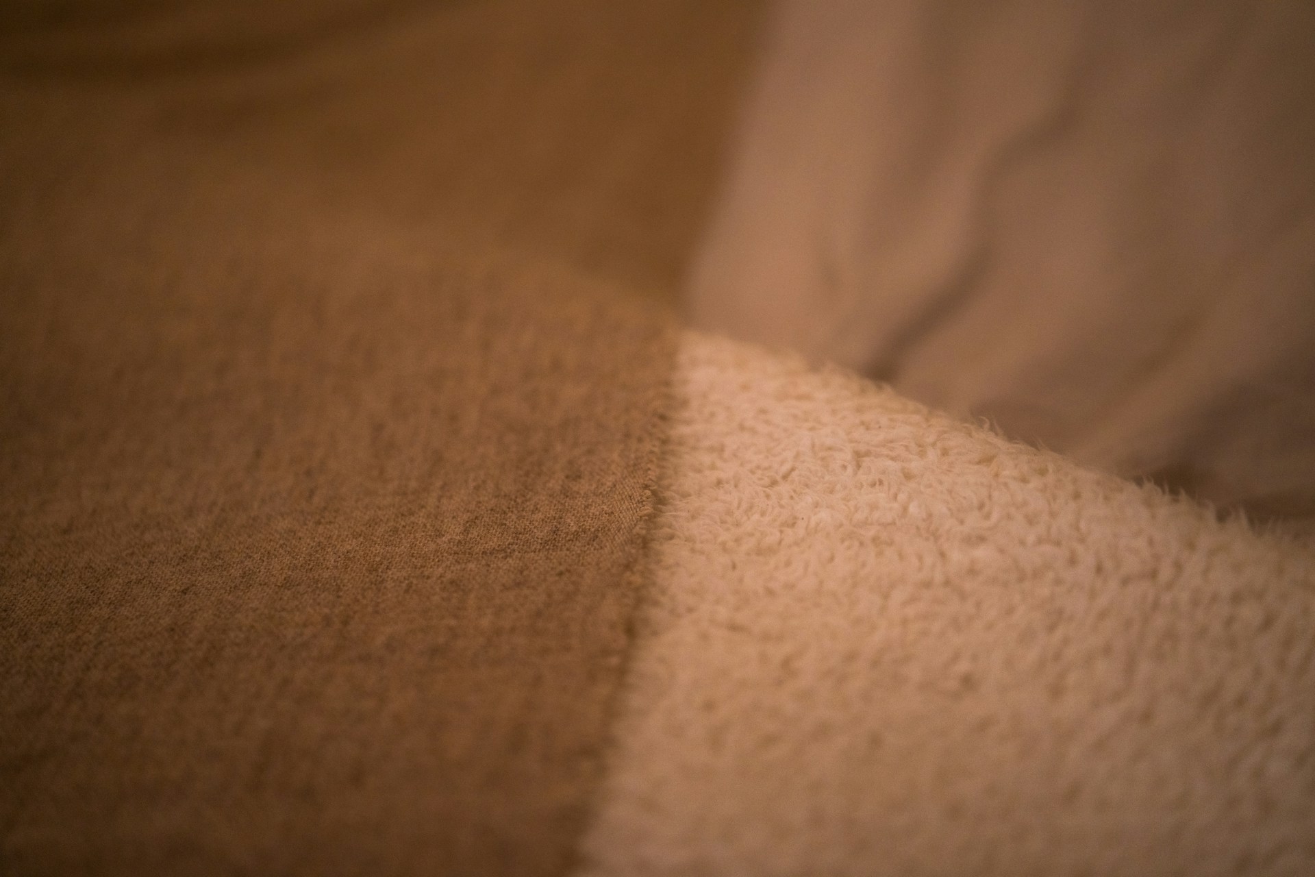 brown and white stripe textile