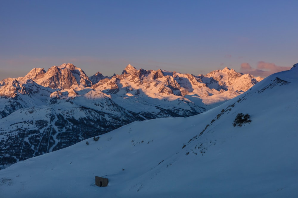 snow covered mountain during daytime