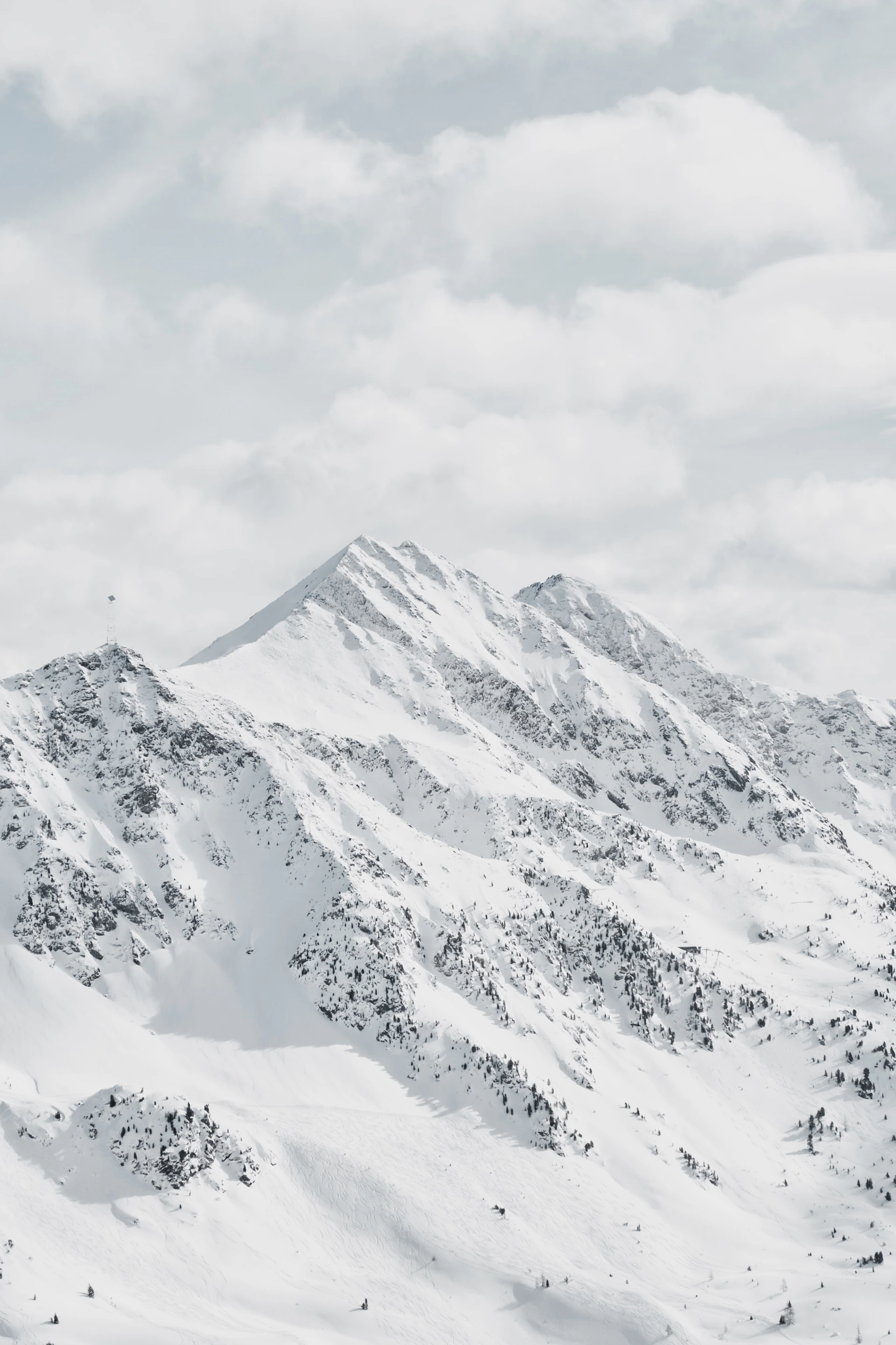 snow covered mountain during daytime