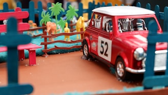 red and white volkswagen t-1 scale model
