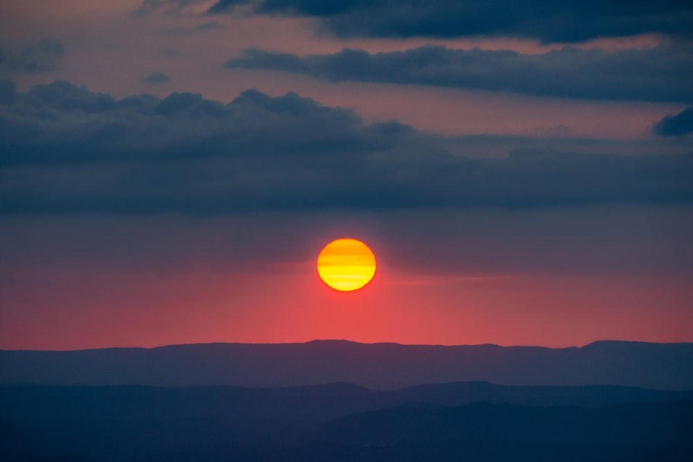 silhouette of mountain during sunset