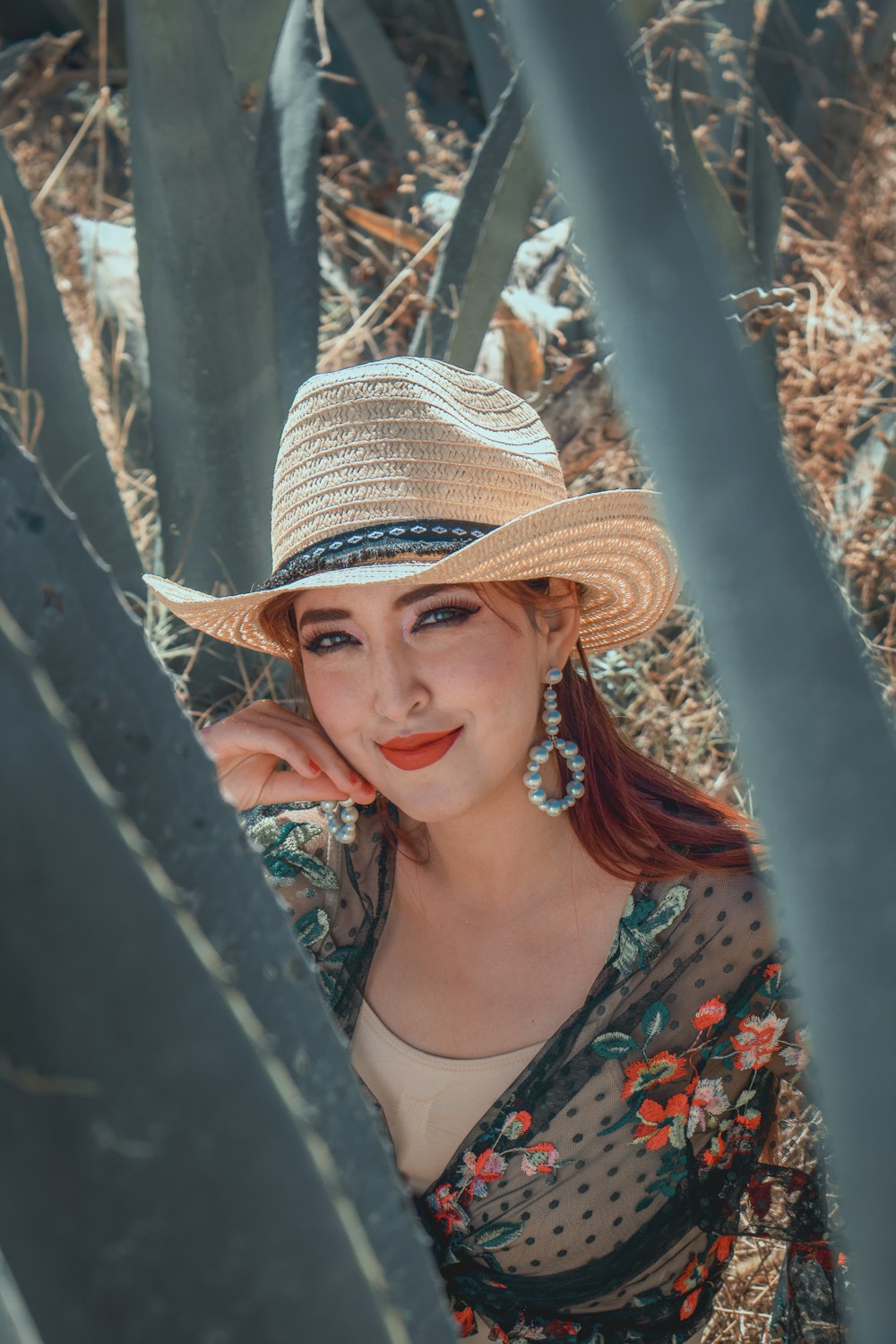 woman in brown and black fedora hat