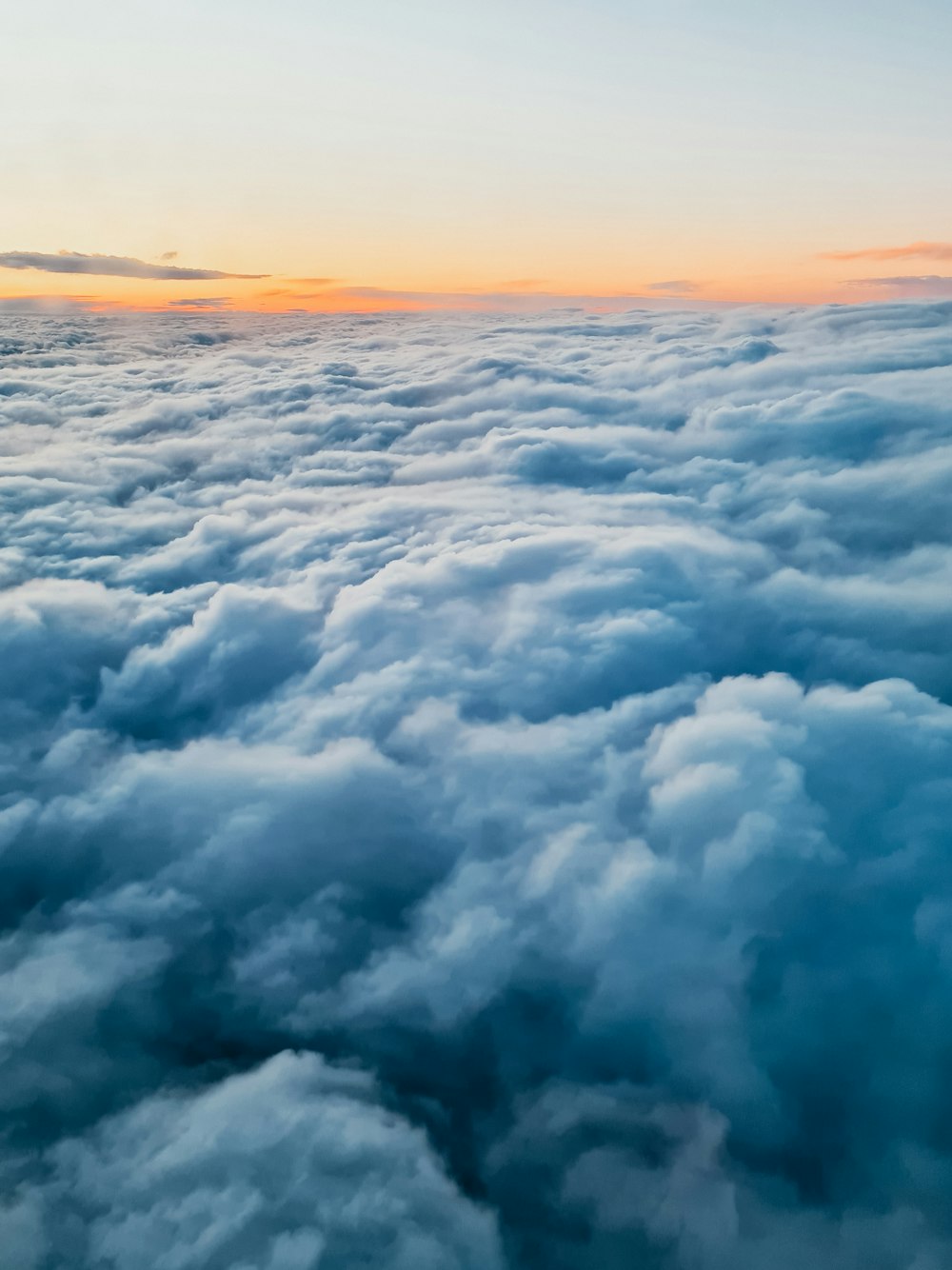 white clouds during golden hour