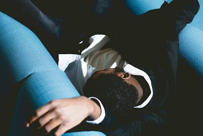 A relaxed person resting comfortably at home after receiving their work stoppage document.