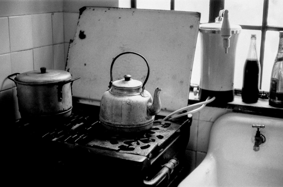 white kettle on gas stove