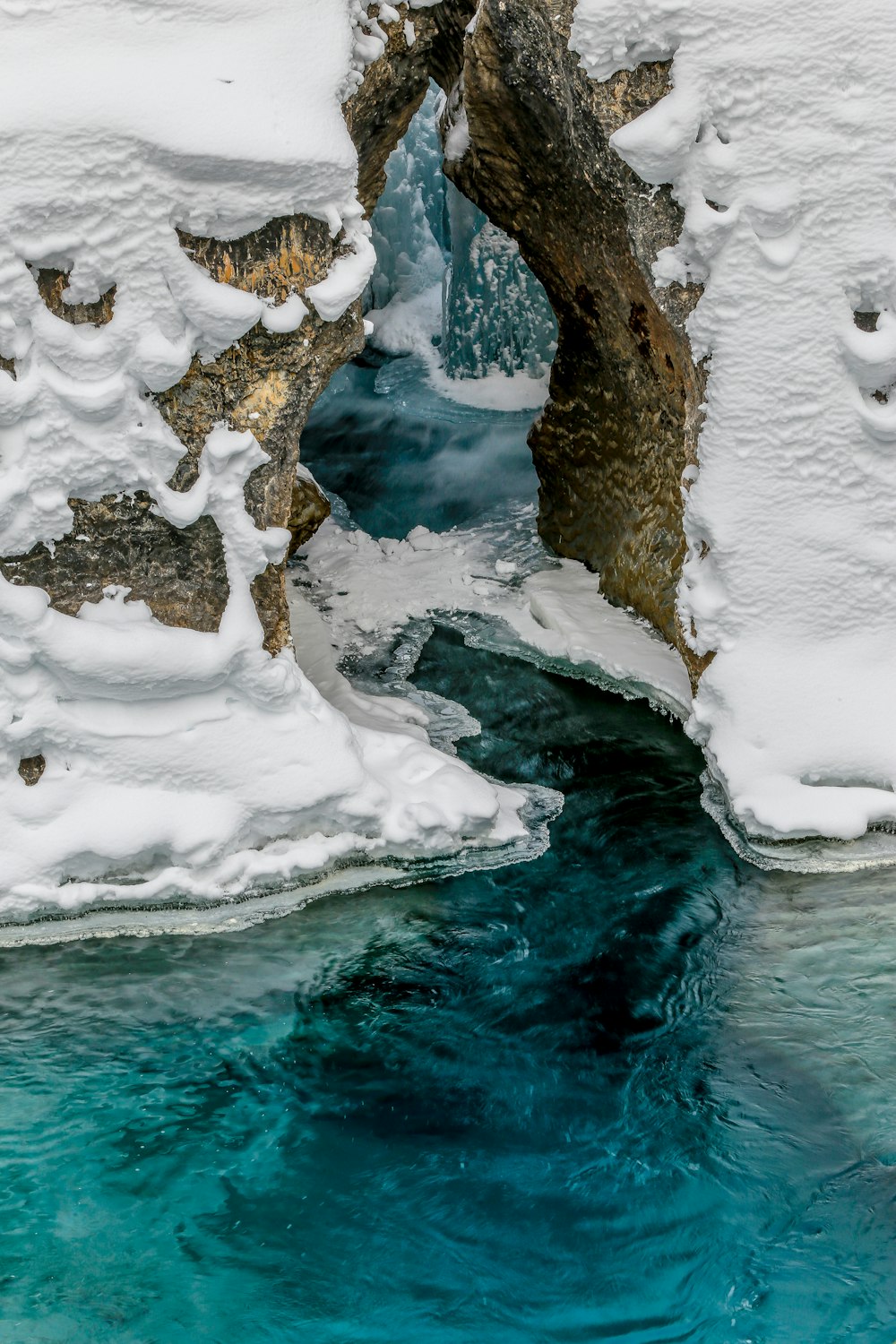 white ice on brown rock