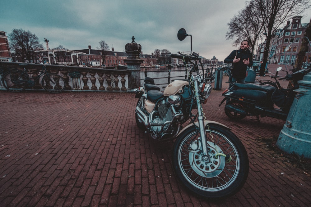 people riding motorcycle on road during daytime