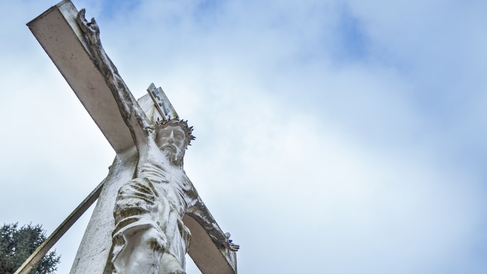 white concrete statue under blue sky during daytime