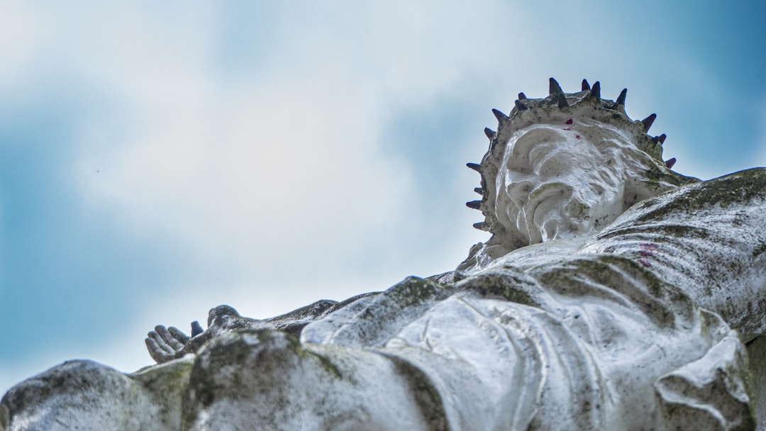 white and black stone fragment, On Good Friday we remember that Jesus died on a cross. This statue reminds us about that
