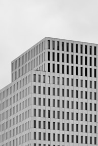white concrete building under white sky during daytime