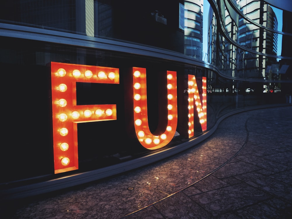 red and black love neon light signage