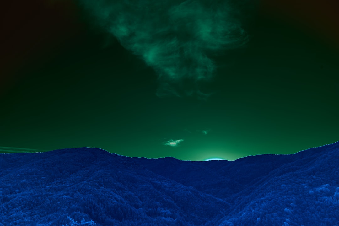 green mountain under blue sky during daytime