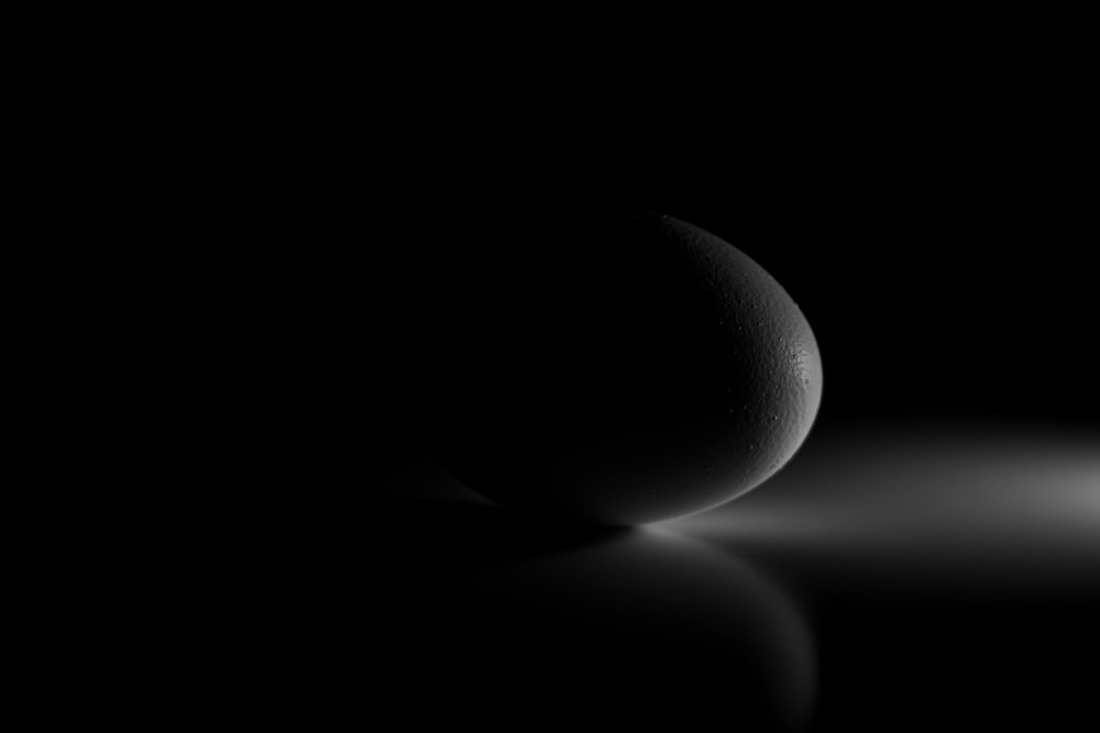 grayscale photo of round ball