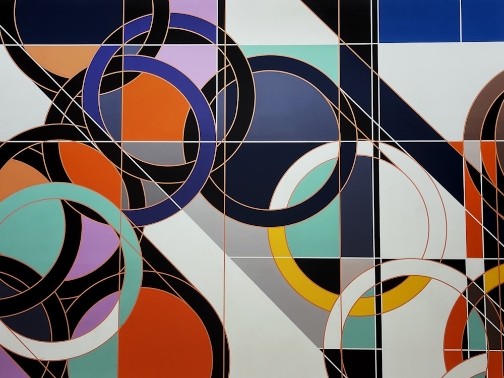an abstract painting of circles and lines on a wall