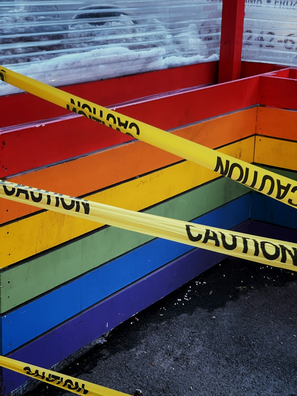 yellow blue and red wooden fence