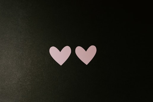 black and white heart print textile