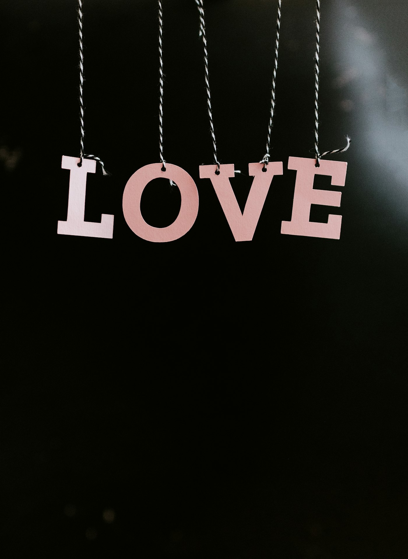 Paper LOVE letters representing traditional first anniversary gift ideas