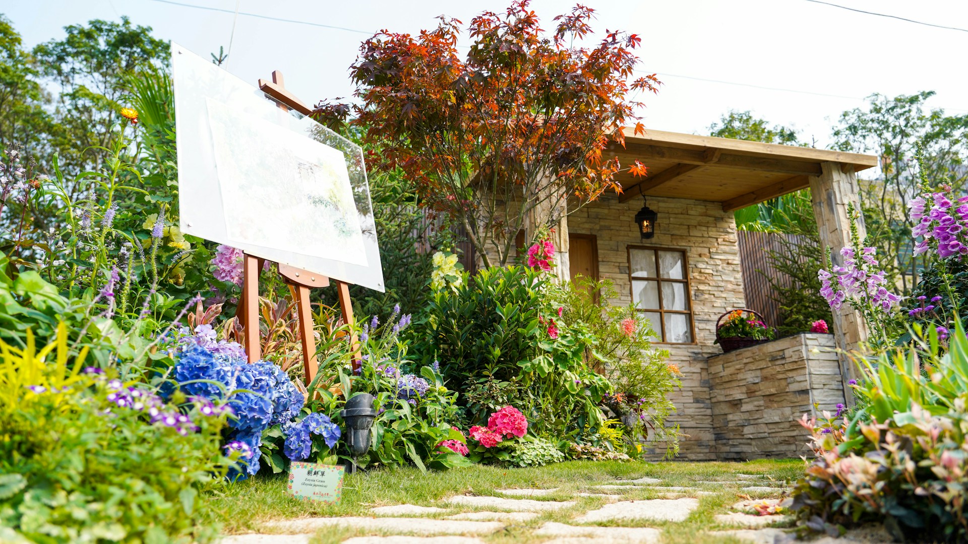 A peaceful corner of the dream cottage garden, where nature and soulful poetry seem to meet under the open sky.