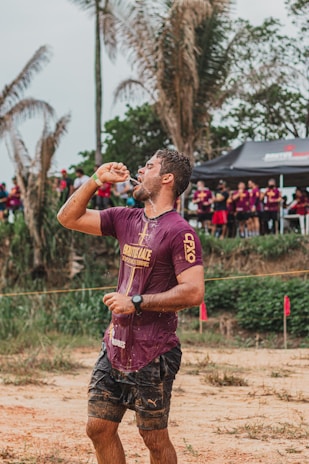 Volunteers handing out water and encouragement at a refreshment station.