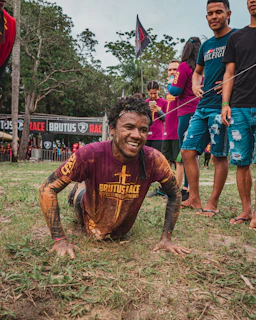 Action shot of competitors sprinting through an obstacle course during a run and gun event.