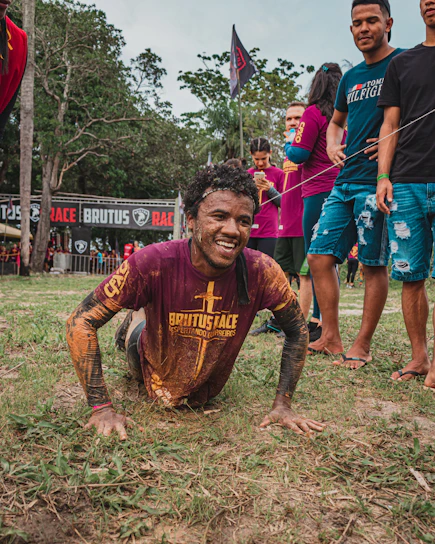 Action shot of competitors sprinting through an obstacle course during a run and gun event.
