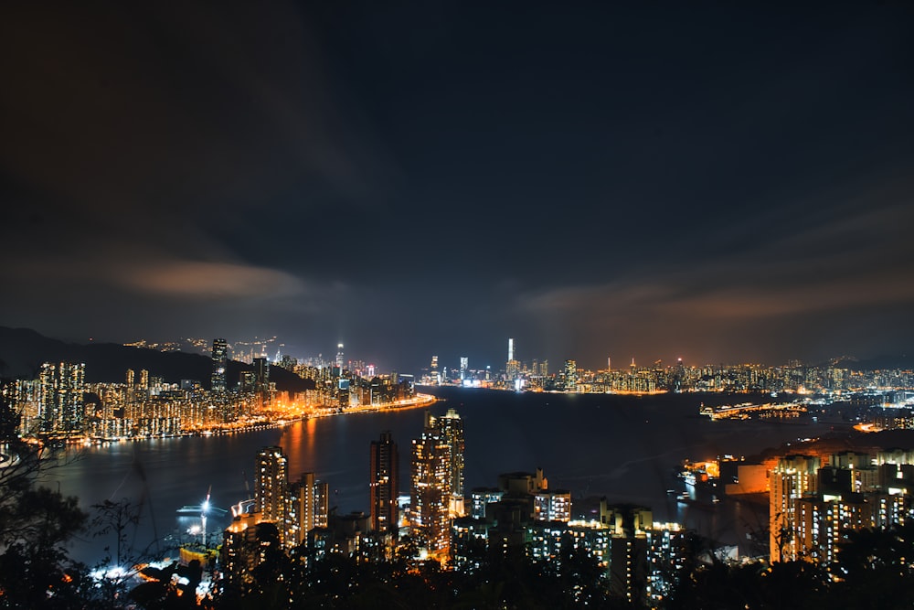 city skyline during night time