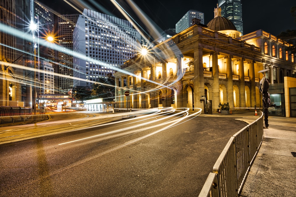 time lapse photography of cars on road during night time