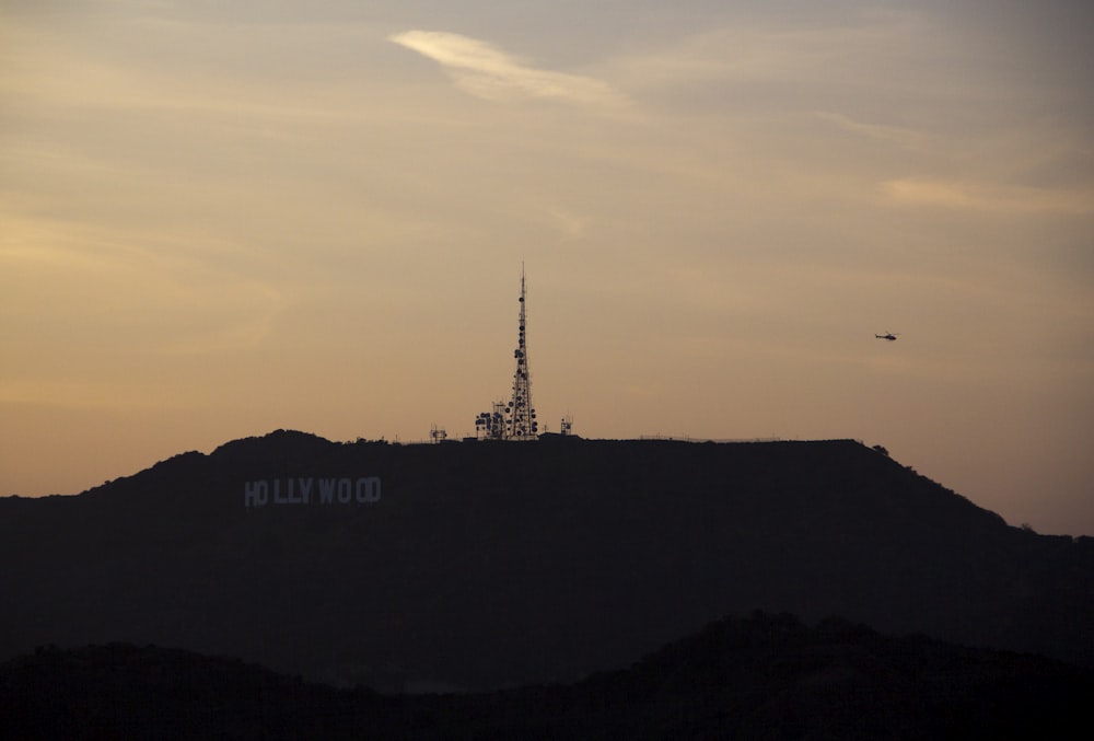 silhouette of mountain during sunset