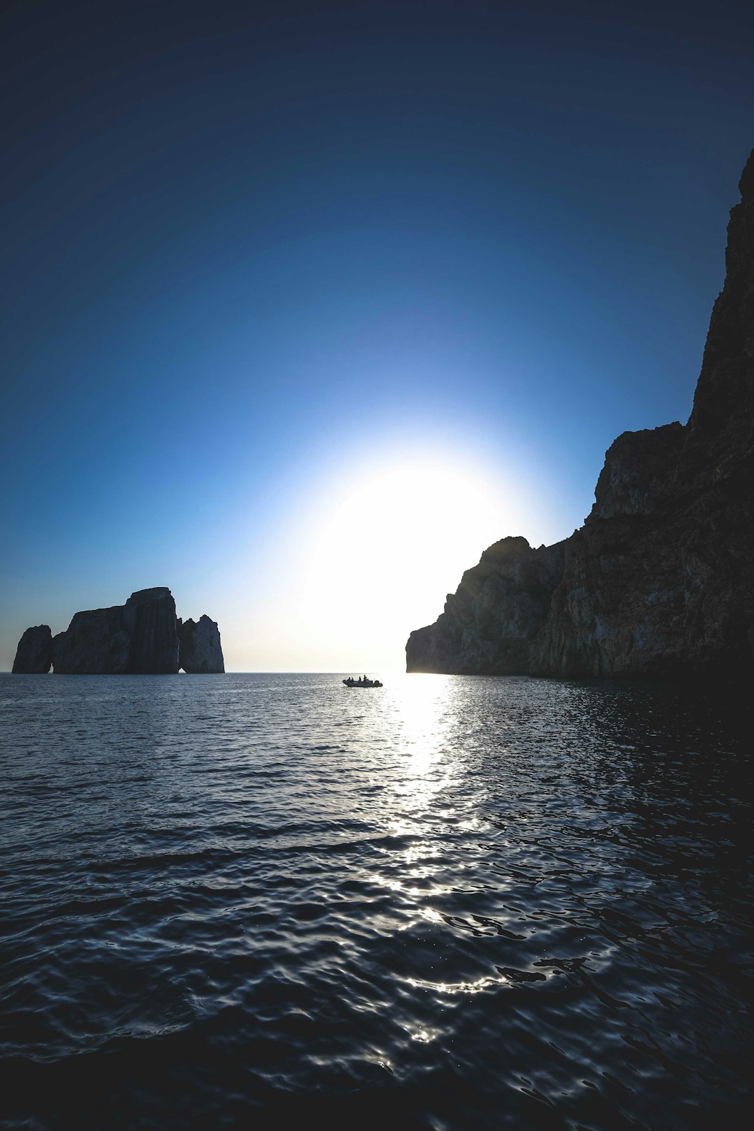 rock formation on sea during daytime