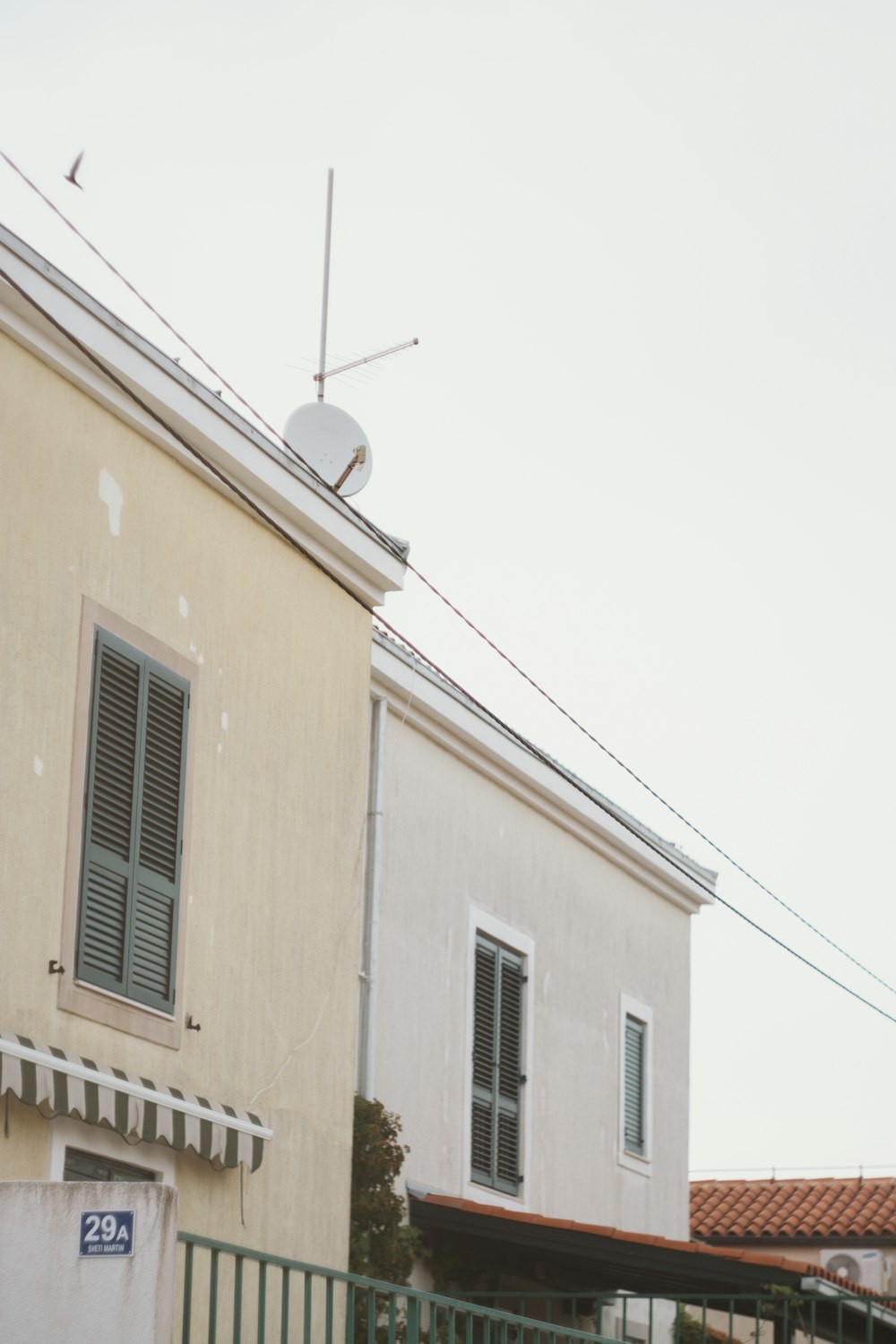 beige concrete building under white sky during daytime