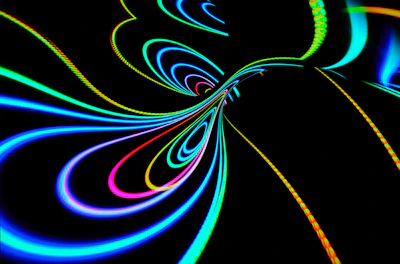 A dynamic motion graphic frame showing swirling lines and vivid neon hues.
