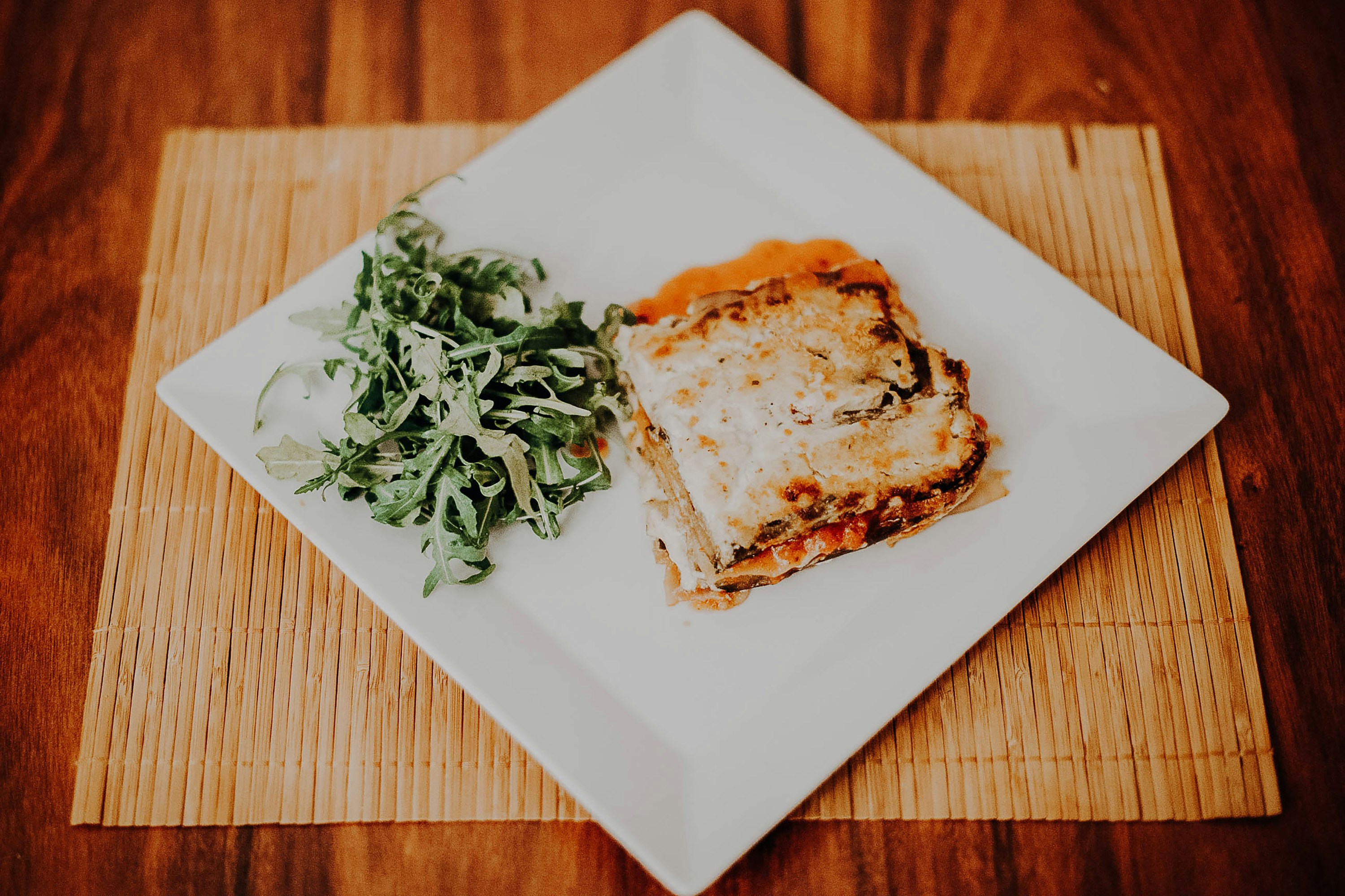 brown and white bread on white ceramic plate